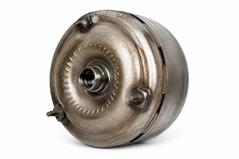 Illustrative used automatic transmission torque converter on a white background